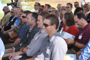 Visitors listening to speakers